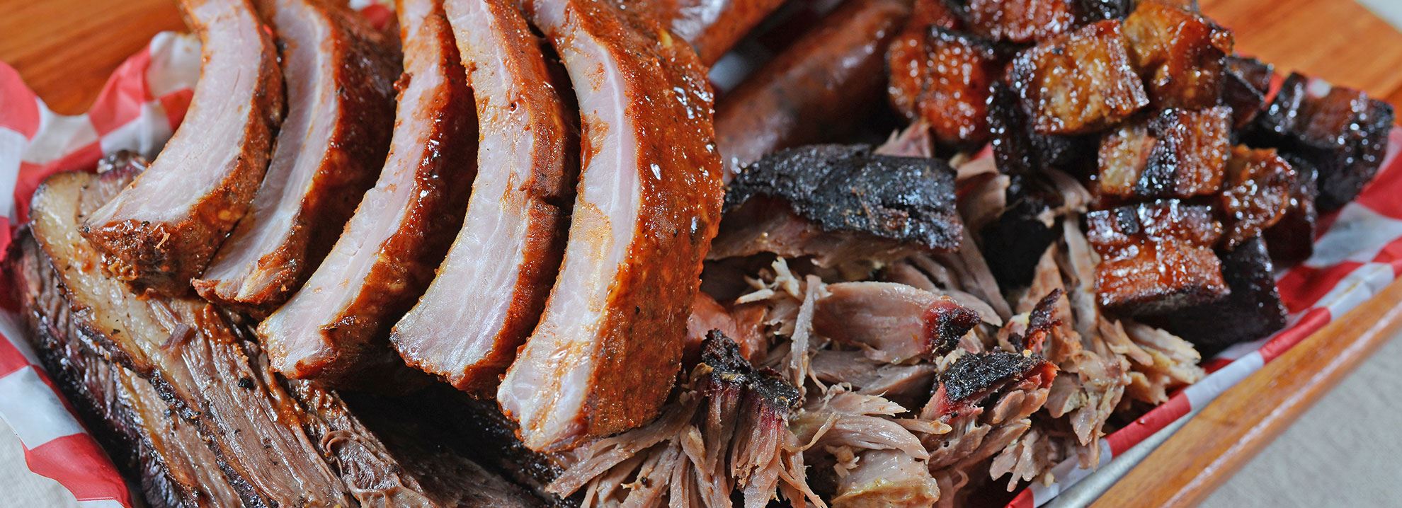 Prime BarbequeRibs • Pulled Pork • Sausages • Brisket